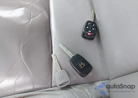 2012 Honda Odyssey Ex-L из США, поврежденный, VIN 5FNRL5H62CB027162